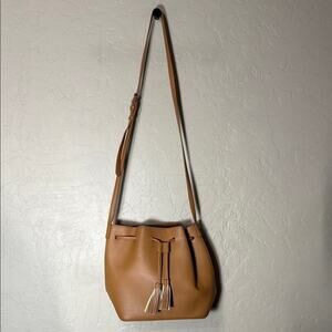 J. Crew drawstring bucket bag vegan leather in camel brown.